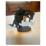 Bronc, riding cowboy statue