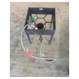 Cast iron fish cooker with regulator