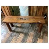 Log wood bench bears in top