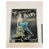 Booty / chest tin sign