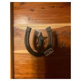 Cast iron horseshoe hanger