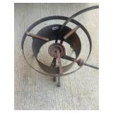 Cast iron fish cooker with regulator