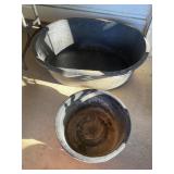 2- black feed buckets trough