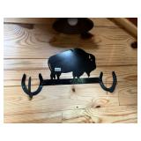 Metal buffalo and horseshoe hanger decor