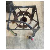 Cast iron fish cooker with regulator