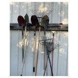 Lot assorted shovels, rakes, all pictured