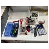 Assorted, mini screwdrivers, hooks, razor blades