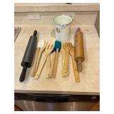 2 rolling pins, wooden utensils, and holder