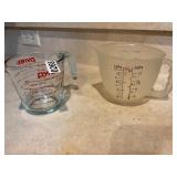 Pyrex glass, mixing cup and plastic mixing cup