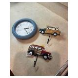 Battery clock and two car hangers.