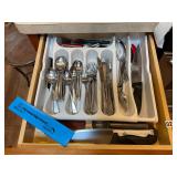 Drawer, full of flatware