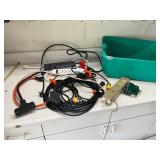 Tote of extension, cord, and surge protectors