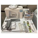 Wii console, controller, wheel, games