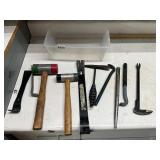 Plastic tote of hammers, pry bars, chipper hammer
