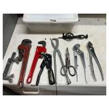 Tote of nine assorted wrenches, pliers, scissors