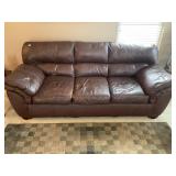 Brown leather couch ï¿½ 7 foot