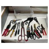 Plastic tote of snips and cutters