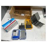 Box of drill, bits, and sharpener