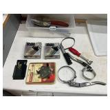 Plastic tote of oil filter wrenches