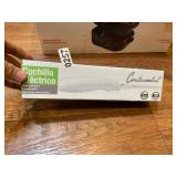 Continental electric carving knife