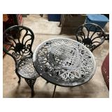 Wrought iron patio table and chairs