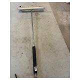 Pressure washer under vehicle attachment