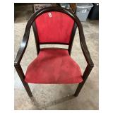 Wood and red fabric chair