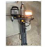 Dual work light tripod stand. One light burnt
