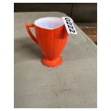 Orange and white vintage creamer