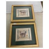 2 gold framed horse pictures