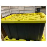 Black and yellow 27 gallon storage tote