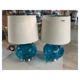 2 blue glass lamps with Shades