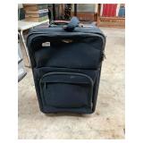 Medium blue rolling suitcase