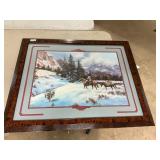 Framed horses and rider snowy mountain