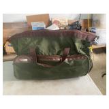 Green Protï¿½gï¿½ rolling duffel