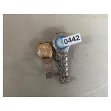 Two watches, Timex and Fahrenheit