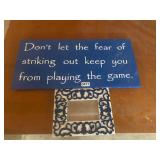 2 blue white wall hangings