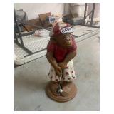 Plaster golfing monkey