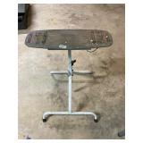 Rigid flip top table