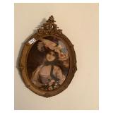 Oval framed lady in hat