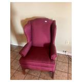 Maroon high wing back chair