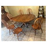 Oak pedestal table and 6 chairs