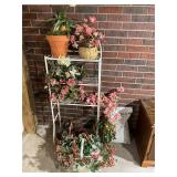Greenery flowers and white metal rack