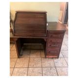 Antique roll top desk with built in file cabinet