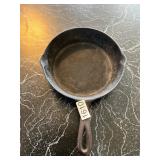 Cast iron skillet with heat ring. 5
