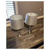 2 sliver and gray lamps