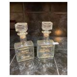 2 glass decanters with stoppers