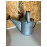 Galvanized watering can