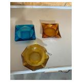 3- vintage colored glass ash trays