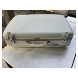 American Tourister vintage hard suitcase